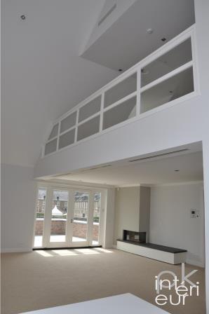 Conception d´intérieur et design de mobilier du séjour avec cheminée et mezzanine de 2 appartements de standing - PK INTERIEUR, Lyon